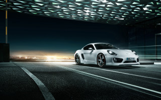 White sports car night city 9 - a city skyline in the background free wallpaper for desktop