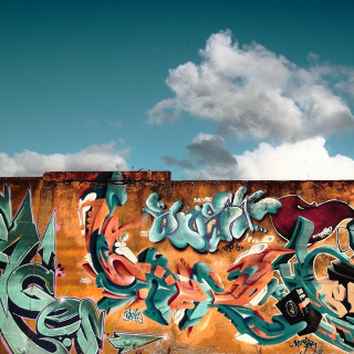 Graffiti wall sky background clouds 2 - white cloud free wallpaper for tablet