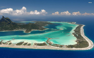 Island lagoon mountain clouds ocean - a blue ocean free wallpaper