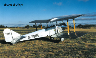 Small airplane grass field yellow - front view free wallpaper