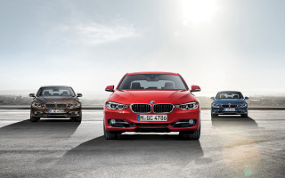 Three colored cars parking lot 3 - a sky background and sun free wallpaper