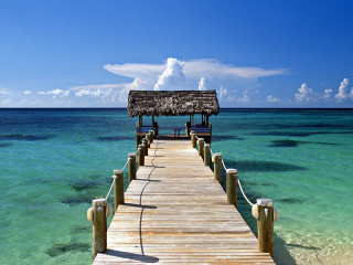 Pier hut ocean clear water - a hut free wallpaper