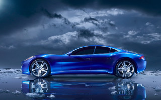 Blue sports car water cloudy - the water under a cloudy sky free wallpaper