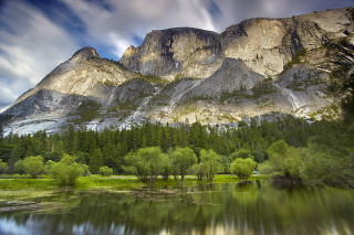 Mountain lake trees foreground cloudy 2 - a lake in front free wallpaper