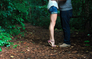 Man woman kissing woods nature - professional free wallpaper for desktop