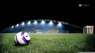 Soccer ball lush green field 5 - alain tasso free wallpaper