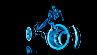 Man riding bike blue light - a bike free wallpaper