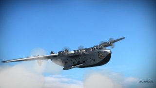 Large airplane flying blue sky 4 - cloud below free wallpaper