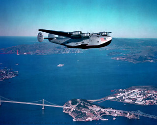 Plane flying water bridge city - a plane free wallpaper