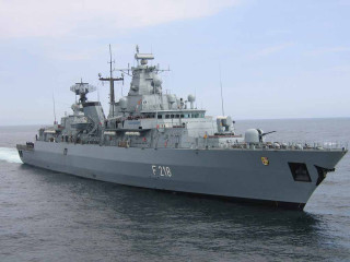 Large gray ship ocean people 5 - a large gray ship in the middle of the ocean free wallpaper