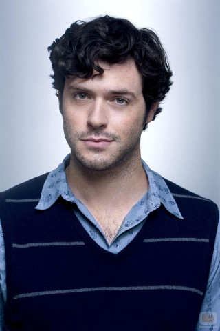Man curly hair blue sweater 2 - christopher perkins free wallpaper