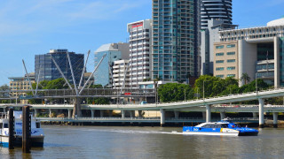 Boat city river buildings bridge - a river next free wallpaper