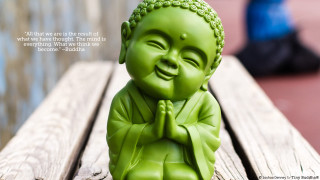 Small green buddha statue wooden - a quote above free wallpaper