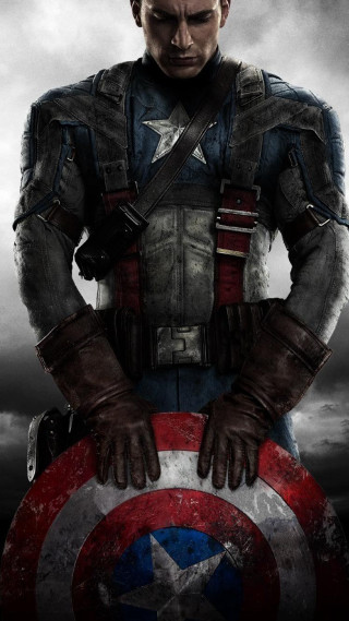 Captain america costume man holding 4 - heroic pose free wallpaper