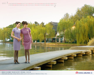 Two women purple dresses lake - a calendar free wallpaper