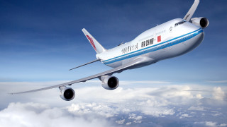 Jetliner blue sky clouds red - stripe free wallpaper