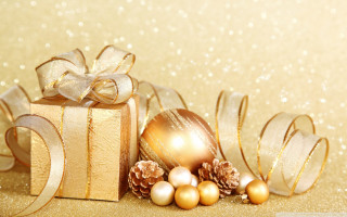Gold gift box bow ornaments - a gold background free wallpaper