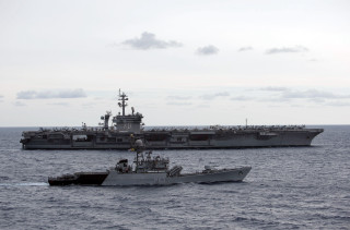 Large ship small boat ocean 2 - incoherent free wallpaper