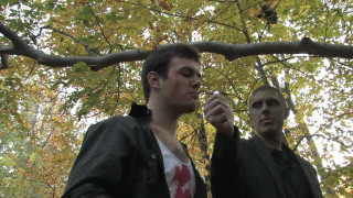 Two men standing tree knife - one man holding free wallpaper for desktop