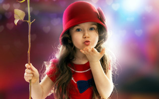 Little girl holding rose red 2 - a rose free wallpaper
