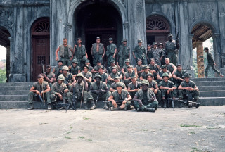 Soldiers group photo building door - a building free wallpaper