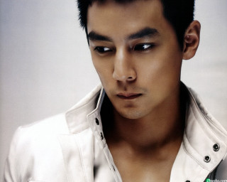 Man white shirt serious staring - choi buk free wallpaper