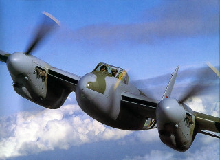 Military plane flying sky background - a military plane free wallpaper