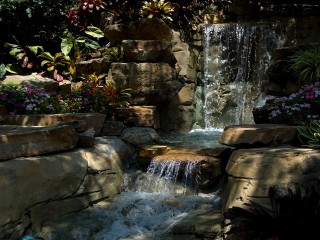 Waterfall garden rocks flowers bench - the side of the waterfall free wallpaper