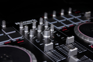 Dj mixing equipment black background - red accent free wallpaper