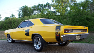 Yellow car forest road puzzle - a yellow car free wallpaper