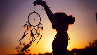 Woman dreamcatcher sunset silhouette tree - the sun setting behind her free wallpaper