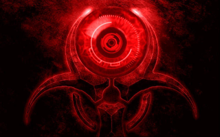 Red biohazard symbol black background - a red light in the middle of the image free wallpaper