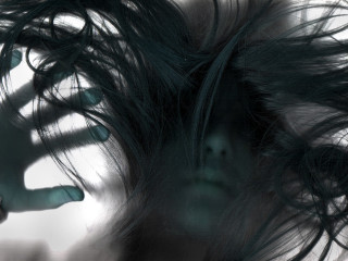 Blurry woman hair creepy face - dark art free wallpaper