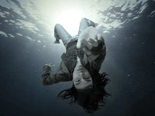 Woman floating water hands up - surreal photography free wallpaper for desktop