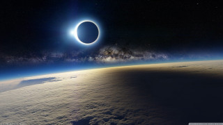 Solar eclipse space clouds stars - a solar eclipse free wallpaper