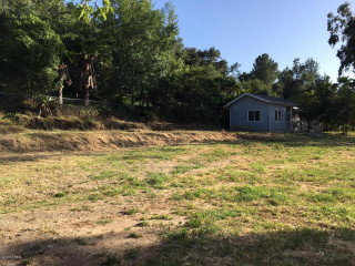 Small house field trees shed - a fenced in area free wallpaper
