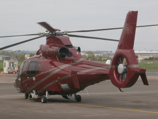 Red helicopter airport tarmac sky - top of an airport tarmac free wallpaper