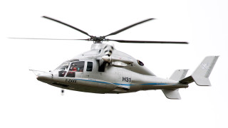 Helicopter flying sky person cockpit - a person inside free wallpaper