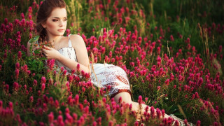 Woman field flowers serious hand - a field of flowers free wallpaper