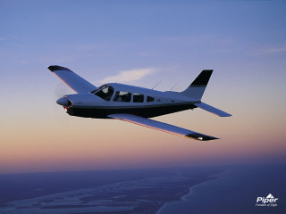 Small plane sunset ocean city - dawn free wallpaper