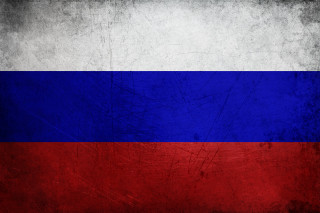 Grungy flag red texture background 2 - a grungy flag free wallpaper