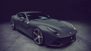Grey sports car dark room - a grey sports car free wallpaper
