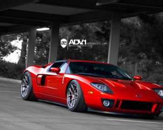 Red sports car parking lot 12 - free 3d render wallpaper