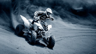 Man riding white fourwheeler dust - daren bader free wallpaper