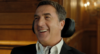 Man phone smiling camera wooden - wall behind free wallpaper