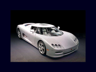 White sports car dark room - a black background behind free wallpaper