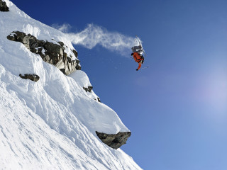 Snowboard jump mountain rocks blue - full round face free wallpaper