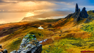 Mountain range rock formation lake - a sun free wallpaper for desktop