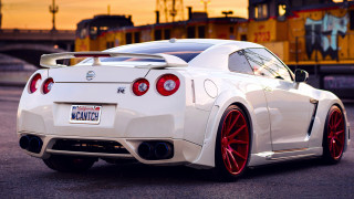 White sports car train track - a train in the background free wallpaper