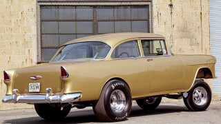 Tan car parked building window - a door free wallpaper